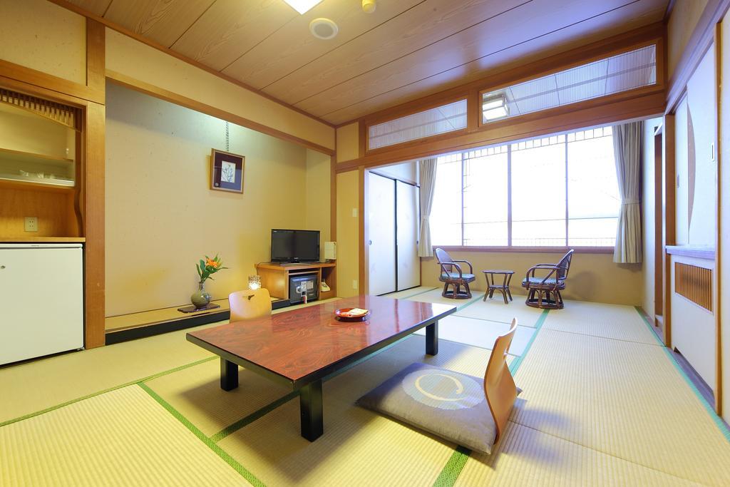 Hotel Awara Onsen Hot Spring Koubou Gurabaatei Zimmer foto