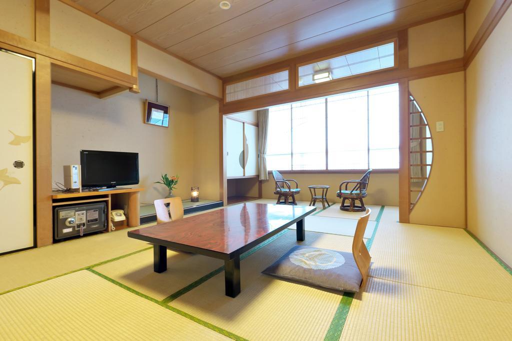 Hotel Awara Onsen Hot Spring Koubou Gurabaatei Zimmer foto