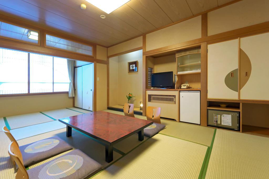 Hotel Awara Onsen Hot Spring Koubou Gurabaatei Zimmer foto